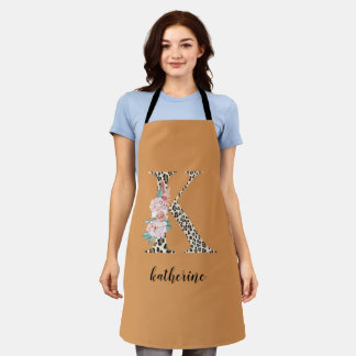 Tablier K Empreinte de léopard de monogramme floral Apron