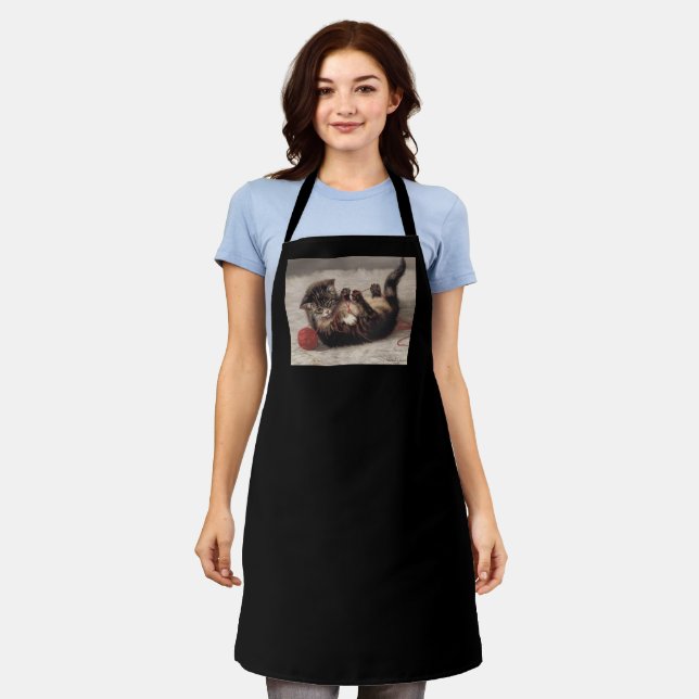 Tablier Le berceau de chat, un chat qui joue à la balle de (Porté)