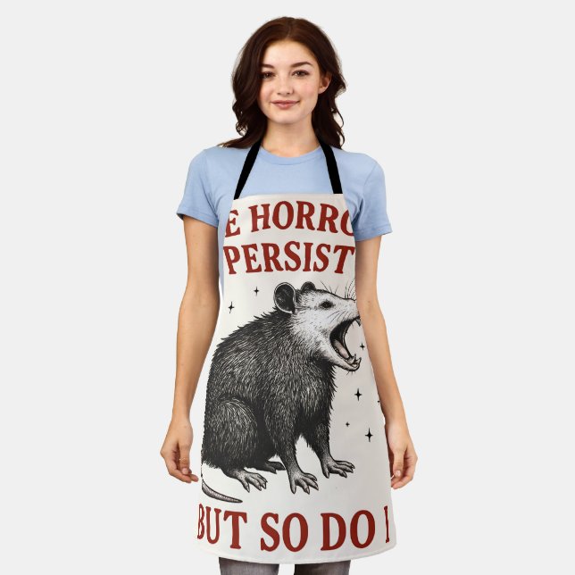 Tablier Les Horreurs Persistent Mais Moi Aussi (Porté)