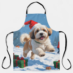 Tablier Lhasa Apso courant dans la neige avec un chapeau d