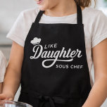 Tablier Like Daughter Sous Chef Typography Design<br><div class="desc">This design features a playful white cooking quote on a bold black background, highlighted with elegant script lettering and a small chef hat icon. The phrase “Like Daughter Sous Chef” gives it a fun family-and-kitchen theme that stands out with clean, high-contrast styling. Its mix of flowing typography and simple layout...</div>