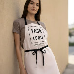 Tablier Marque du logo de l'entreprise rose pâle<br><div class="desc">Découvrez l'épitome du professionnalisme personnalisé avec nos tabliers personnalisés, conçus exclusivement pour encapsuler l'essence de votre marque ! Nos tabliers de qualité supérieure ne sont pas seulement une couverture protectrice, ils sont une déclaration de l’identité unique de votre marque. Avec votre logo d’entreprise personnalisé et élégamment brodé ou imprimé, ces...</div>
