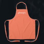 Tablier Moderne Pêche Orange Script femmes Personnalisé<br><div class="desc">Montrez votre style tout en cuisine avec cet tablier personnalisé féminin Peach Orange Script moderne. Le nom est en élégant script blanc centré sur l'avant de l'apron couleur pêche solide. Idéal pour protéger les vêtements contre les taches et les déversements pendant la cuisine. Disponible en différentes couleurs. Cliquez sur l'option...</div>