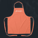 Tablier Moderne Pêche Orange Script femmes Personnalisé<br><div class="desc">Montrez votre style tout en cuisine avec cet tablier personnalisé féminin Peach Orange Script moderne. Le nom est en élégant script blanc centré sur l'avant de l'apron couleur pêche solide. Idéal pour protéger les vêtements contre les taches et les déversements pendant la cuisine. Disponible en différentes couleurs. Cliquez sur l'option...</div>