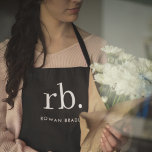 Tablier Monogram Classic Elegant Minimum Black and White<br><div class="desc">A minimalist monogram design with large typographiy initials in a classic font with your name below on black background. Le Parfait Custom vend des accessoires !</div>