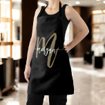 Tablier Monogramme typographique moderne minimaliste en or<br><div class="desc">Cuire dans le style avec le minimal noir et or moderne Monogramme Apron. Doté d'un design noir élégant et d'un monogramme typographique en or audacieux, cet tablier allie élégance moderne et fonctionnalité. Parfait pour la cuisine, la cuisson ou la grillade, il offre une couverture complète et le confort pendant que...</div>