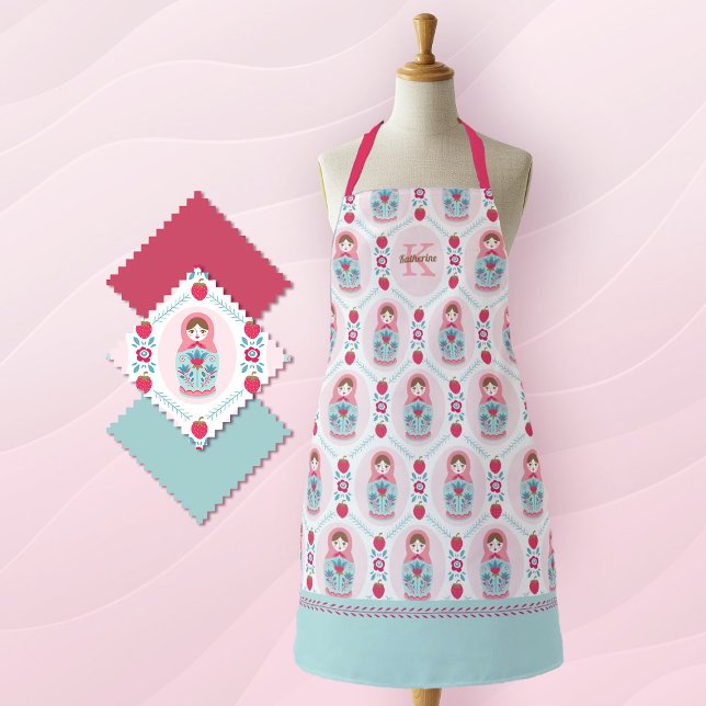 Tablier Motif Monogram migte rose Matryoshka (a cute pink and blue matryoshka nesting doll pattern decorates this apron. add a monogram name!)