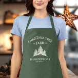 Tablier Nom de famille personnalisé Christmas Tree Farm Re<br><div class="desc">Cuisinez de la magie de vacances avec ce tablier personnalisé ! Doté de votre nom de famille et d'un design rétro de la ferme des arbres de Noël en vert sage,  c'est la touche festive parfaite pour la cuisine de vacances et les repas de famille.</div>