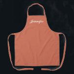 Tablier Orange Peach Girl Script Monogramme Personnalisé<br><div class="desc">Montrez votre style tout en cuisine avec cet Orange Peach Girly Script Monogramme personnalisé tablier. Le nom est conçu dans un élégant script blanc centré sur l'avant d'un tablier orange clair solide. Idéal pour protéger les vêtements contre les taches et les déversements pendant la cuisine. Disponible en différentes couleurs. Cliquez...</div>