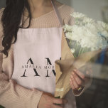 Tablier personnalisé Monogram Pastel Rose<br><div class="desc">Ajoutez une touche d'élégance à votre tenue de cuisine grâce à ce tablier personnalisé Monogram Pastel Pink. Doté d'une teinte rose pastel douce et d'un monogramme personnalisable, cet tablier est parfait pour ceux qui aiment cuisiner dans le style. Fabriqué avec des matériaux de haute qualité, il offre à la fois...</div>