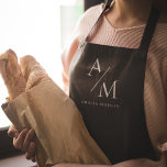 Tablier personnalisé noir monogramme<br><div class="desc">Cuire dans le style avec ce tablier Monogram Black Personnalisé. Doté d'un design noir élégant et d'un monogramme personnalisable, cet tablier ajoute une touche de sophistication à toute cuisine. Fabriqué à partir de matériaux durables et de haute qualité, il offre confort et protection, ce qui le rend parfait pour les...</div>