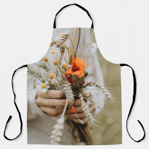 TABLIER PERSONNE DÉTENANT ORANGE FLEURS PEALED