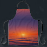 Tablier Sunset Horizon Apron<br><div class="desc">This apron features a serene sunset design with a gradient sky shifting from deep purple to glowing orange at the horizon. The sun casts a warm light over calm ocean waves, while birds soar gracefully across the sky, adding movement to the tranquil scene. Combining vivid colors with peaceful imagery, this...</div>