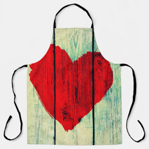 Tablier Symbole d'amour sur mur en bois