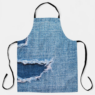 Tablier Tissu en denim déchiré, teintes bleues.