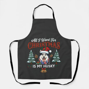 Tablier Tout ce que Noël veut est un chien husky avec un c
