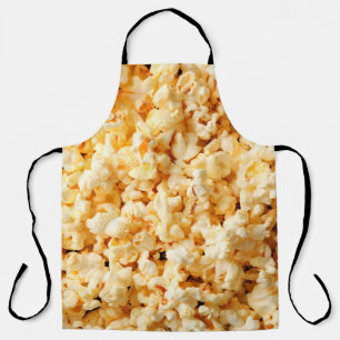 Tablier Un bon popcorn sur tout l'arrière - plan. Nourritu