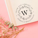 Tampon Auto-encreur Monogramme et couronne florale de la bibliothèque<br><div class="desc">Ajoutez une touche élégante à tous vos livres préférés avec notre chic monogramme Floral Wreath From the Library of Bookplate, avec votre monogramme initial unique en lettres serif classiques, encadré par une couronne de fleurs, bourgeons et petits feuilles botaniques dessinés à la main. "De la bibliothèque de" apparaît dans un...</div>