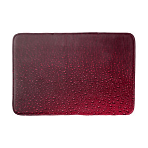 Tapis De Bain Baisses d'eau sur le chaume de surface rouge
