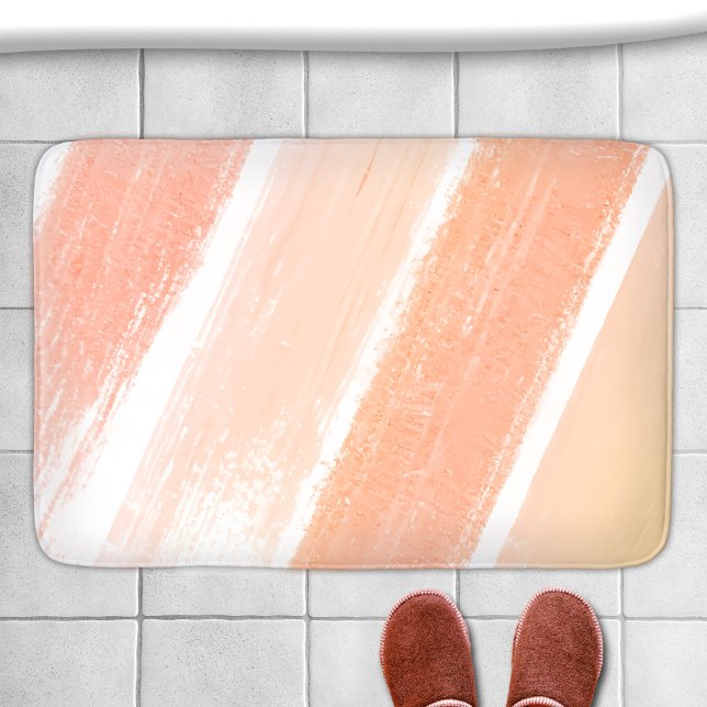 Tapis De Bain Échantillon de peinture rayé rose corail pêche (Bath mat featuring a paint swatch in peach, coral and pink colors)