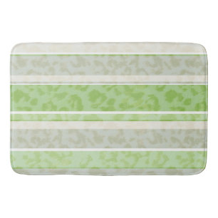 Tapis De Bain Empreinte de léopard sur arrière - plan rayé.