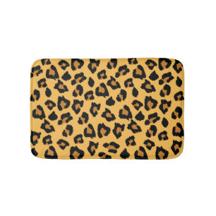 Tapis de bain jaune et noir d'empreinte de léopar