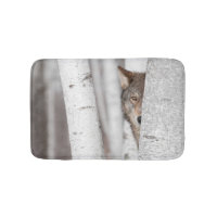 Loup gris (lupus de Canis) derrière l'arbre