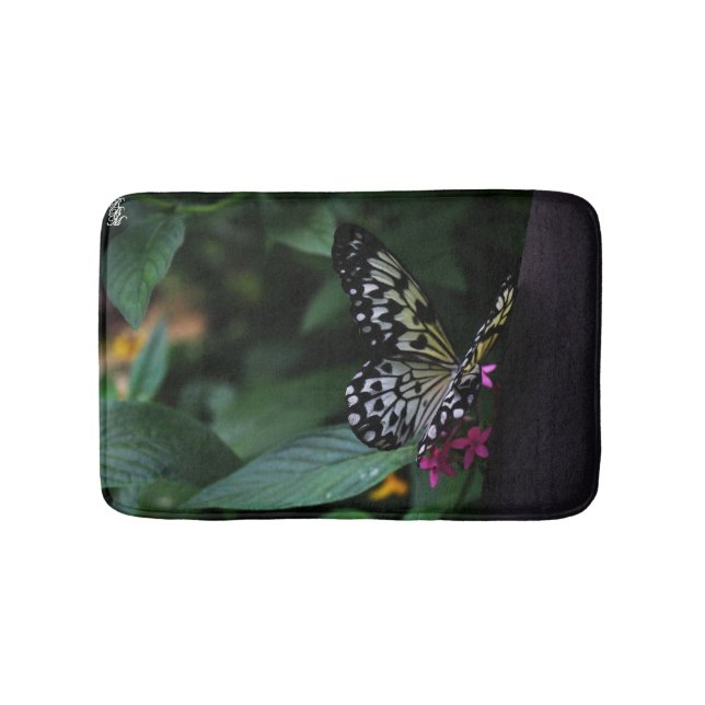 Tapis De Bain Un papillon jaune sur des fleurs roses (Devant)