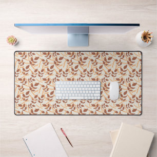 Tapis de bureau à fond crème avec feuilles mortes