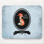 Tapis De Souris Cute Fox dans Christmas Hat inside a Black Oval<br><div class="desc">Un pavé de souris personnalisé avec une jolie illustration de renard orange à l'intérieur d'un ovale noir. Il porte aussi un chapeau de santa rouge et a des accents de décoration vert festif sur la queue et sur la poitrine. Joyeux Noël est également écrit dans le cadre ovale. L'arrière -...</div>