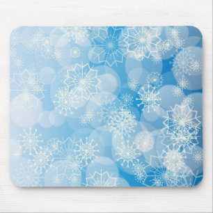 Tapis De Souris Flocons de Noël sur un fond bleu