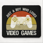 Tapis De Souris Just A Boy Who Loves Video Games<br><div class="desc">Just A Boy Who Loves Video Games. This funny gamer accessory is a great gift for a man, boy, teens & kids who love playing video games & computer games. If you're a geek and love console games & computer gaming, this design is for you! Includes a graphic of a...</div>
