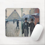 Tapis De Souris "Paris Street ; Rainy Day" Scène impressionniste<br><div class="desc">Apportez une touche d'élégance parisienne à votre espace de travail avec Paris Street ; Rainy Day, chef-d'oeuvre emblématique de Gustave Caillebotte (1848-1894), figure de proue du mouvement impressionniste français. Connu pour ses scènes urbaines saisissantes, Caillebotte saisit un moment de la vie parisienne lors d'une tempête de pluie, où les piétons...</div>