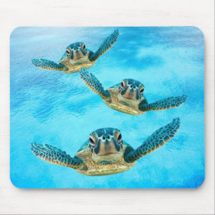 Tapis De Souris Trois tortues de mer de bébé nageant