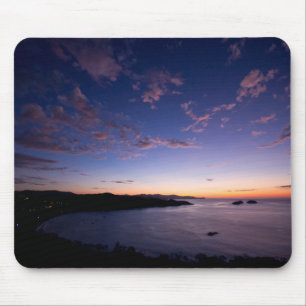 Tapis De Souris Un coucher du soleil au-dessus de l'océan en le