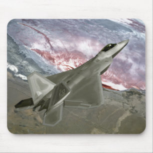 Tapis De Souris Un F/A-22 Raptor effectue une mission de formation