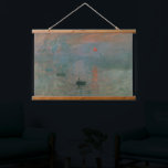 Tapisserie Suspendue Claude Monet Impression Soleil Levant Impression a<br><div class="desc">Le chef-d'œuvre de Claude Monet datant de 1872, "Impression, soleil levant", est l'œuvre séminale qui a donné naissance au mouvement impressionniste. Il représente le port du Havre à travers une brume matinale embrumée. Le soleil orange frappant sert de point focal, jetant un reflet vibrant et rythmique sur les ondulations bleues...</div>