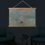 Tapisserie Suspendue Claude Monet Impression Sunrise Classic Peinture<br><div class="desc">Claude Monet "Impression, Sunrise" est une oeuvre majeure qui incarne le mouvement impressionniste. Peinte en 1872, la toile capture la qualité éphémère de la lumière et de l'atmosphère à l'aube dans la ville portuaire du Havre, France. Monet utilise des coups de pinceau lents et rapides pour transmettre les effets transitoires...</div>
