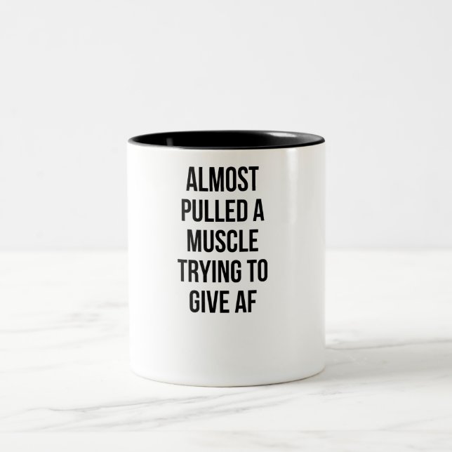 Tasse 2 Couleurs A presque tiré un muscle essayant de donner le (Centre)