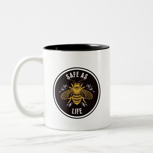Tasse 2 Couleurs Aussi sûr que la vie (Gauche)