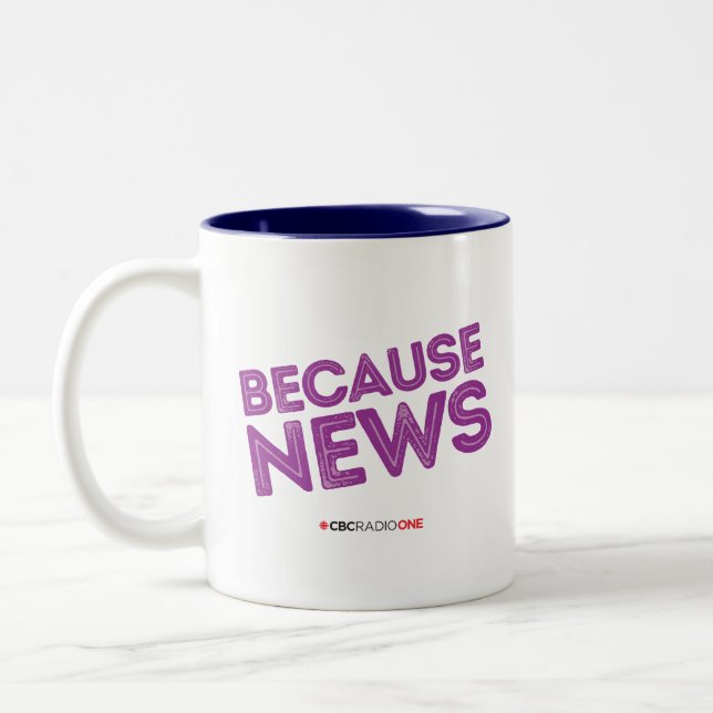 Tasse 2 Couleurs CBC Parce que les nouvelles (Gauche)