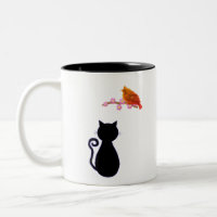 Chat noir et oiseau rouge