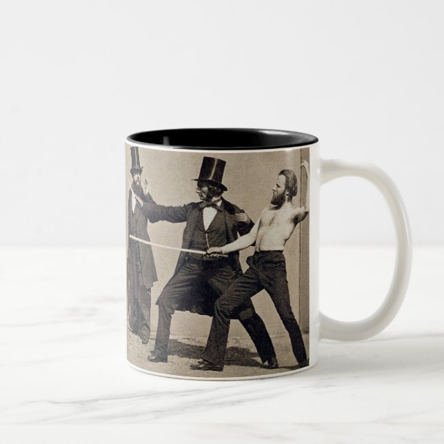 Tasse 2 Couleurs Combat en duel (photo) (Droit)