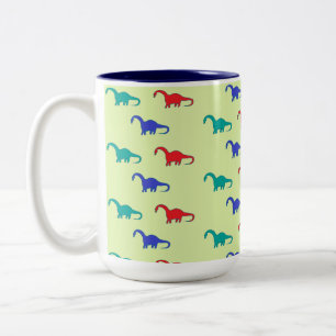Tasse 2 Couleurs Dinosaures colorés motif sur vert