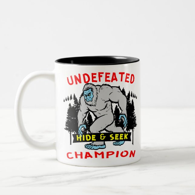 Tasse 2 Couleurs Indéfectible Hide & Chercher Champion Bigfoot 04 # (Gauche)