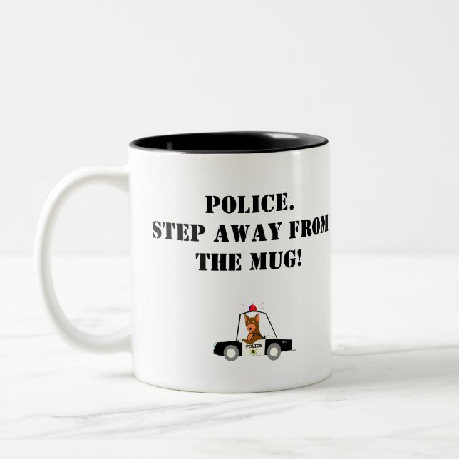 Tasse 2 Couleurs Les policiers matraquent (Gauche)