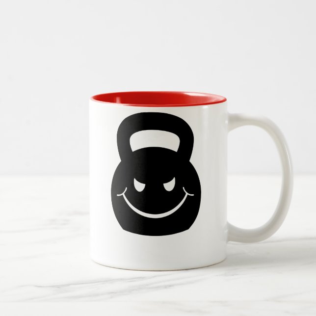 TASSE 2 COULEURS MAL KETTLEBELL SOURIANT D'UN AIR AFFECTÉ (Droit)