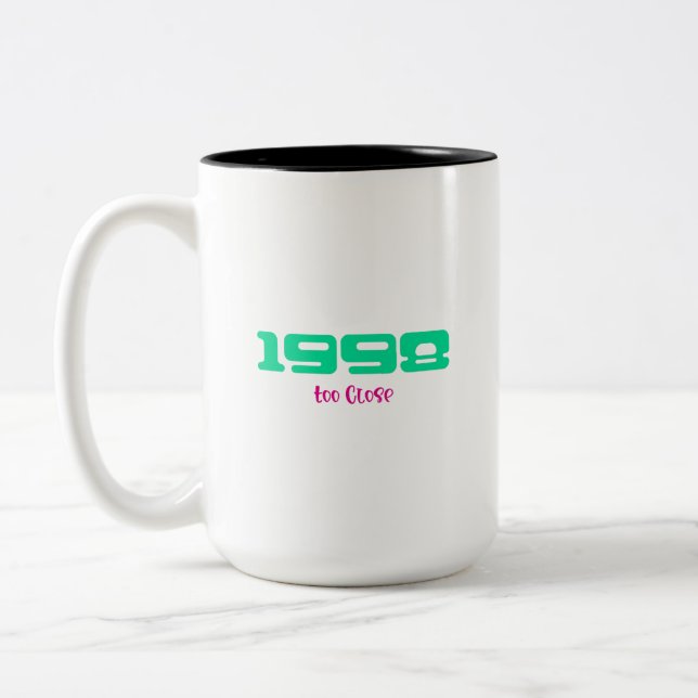 Tasse 2 Couleurs Meilleur morceau de 1998 (Gauche)
