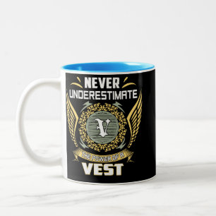 Tasse 2 Couleurs Ne sous-estimez jamais le pouvoir d'un gilet