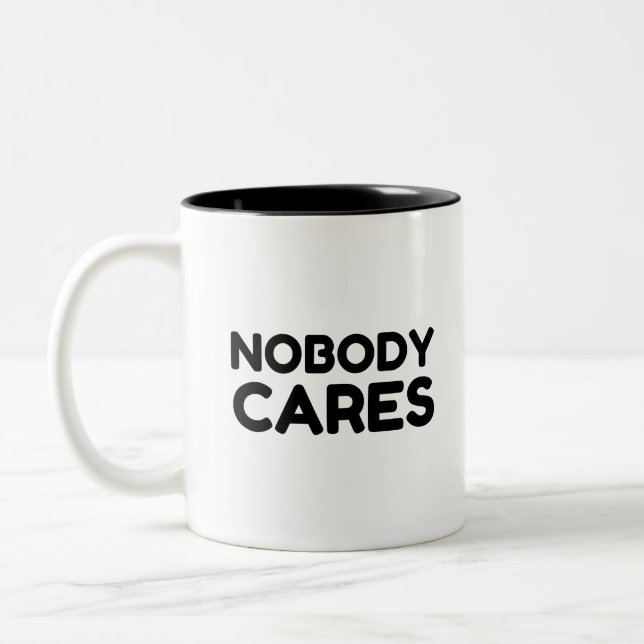 TASSE 2 COULEURS PERSONNE NE S'OCCUPE (Gauche)